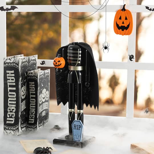 Glitzhome® 14.5" Halloween Wood Headless Horseman with Ornament Nutcracker
